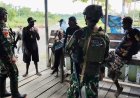 Marinir Yonif 5 Hangatkan Kebersamaan Warga Kampung Muara Yahukimo